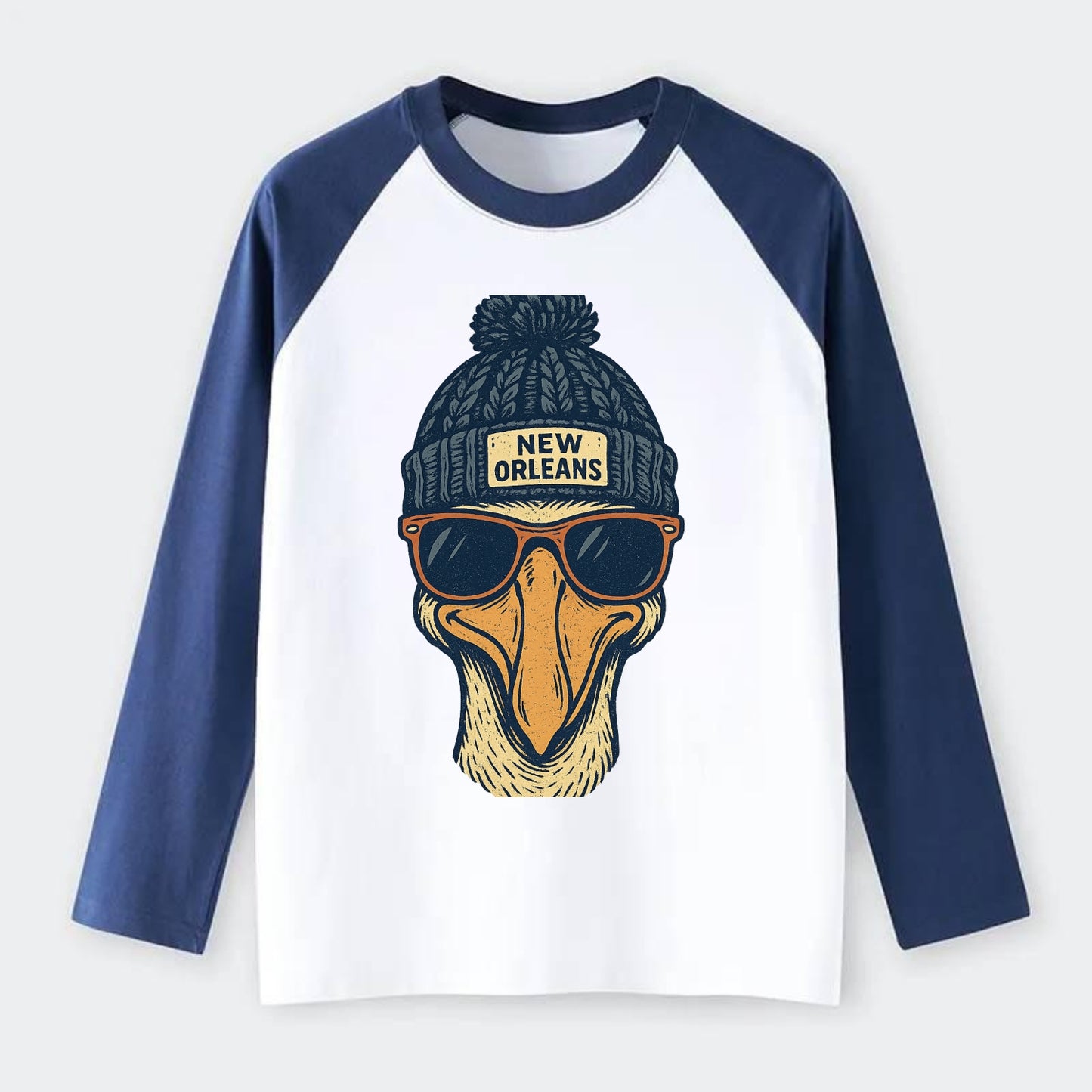 New Orleans Pelican wearing New Orleans beanie with pom pom and - Raglan Long Sleeve T-Shirt - Blue