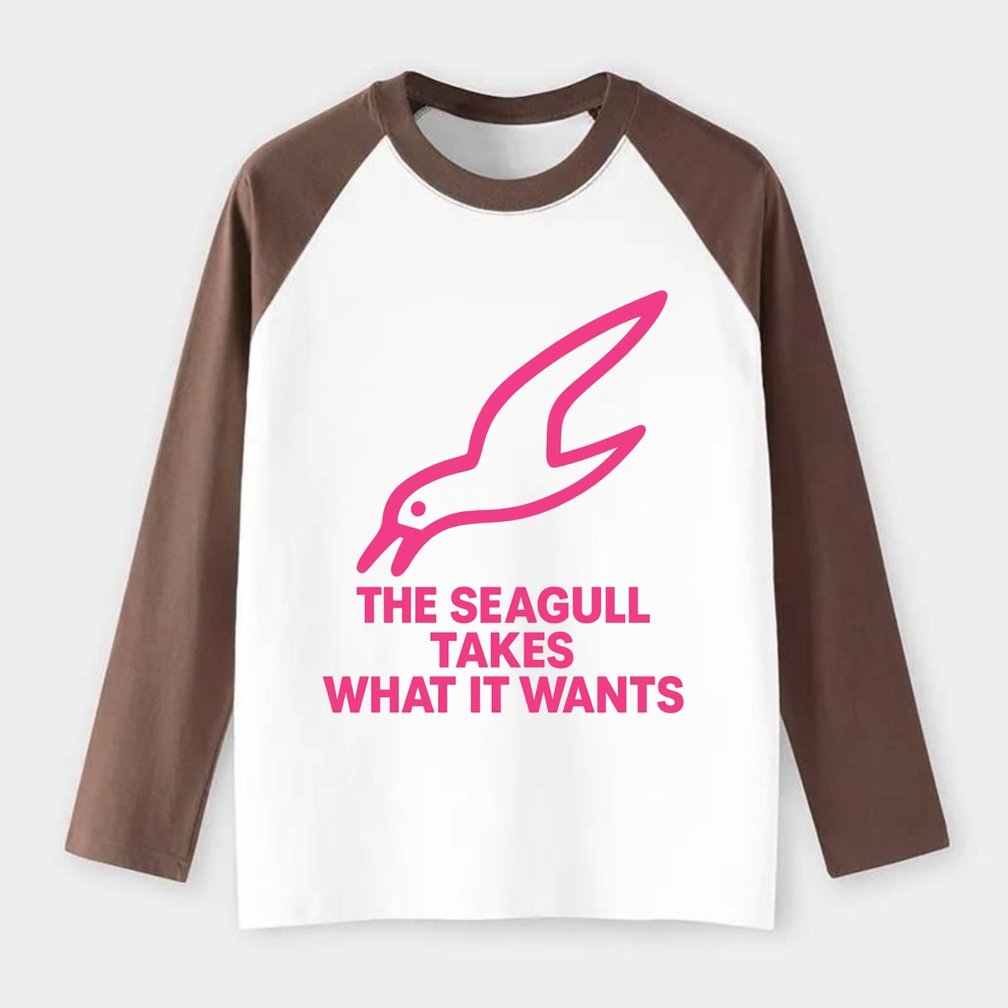 THE SEAGULL TAKES WHAT IT WANTS | Aggressive seagull diving down - Raglan Long Sleeve T-Shirt - Coffee
