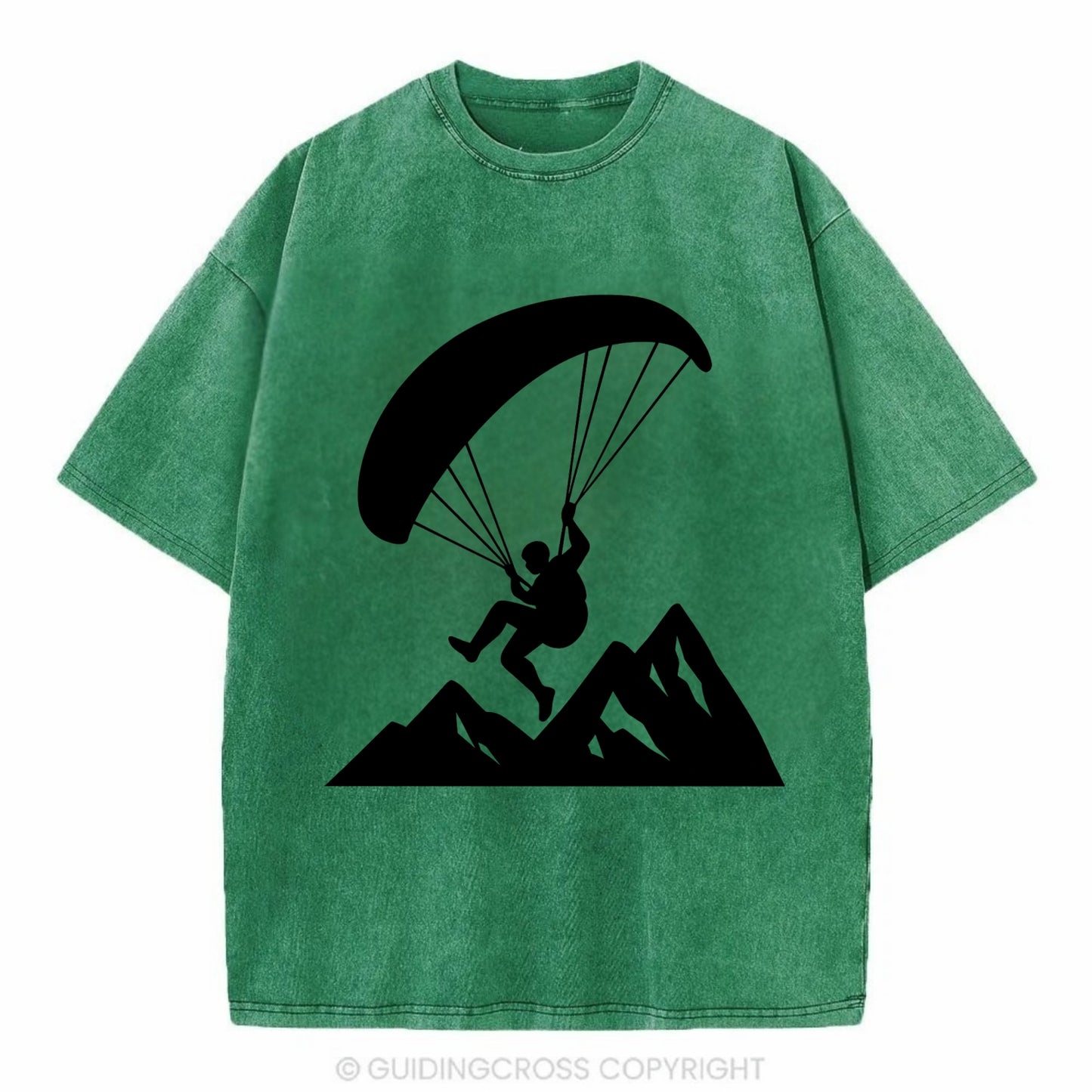 Paraglider soaring over mountain peaks - Vintage T-shirt - Forest Mist(Green)