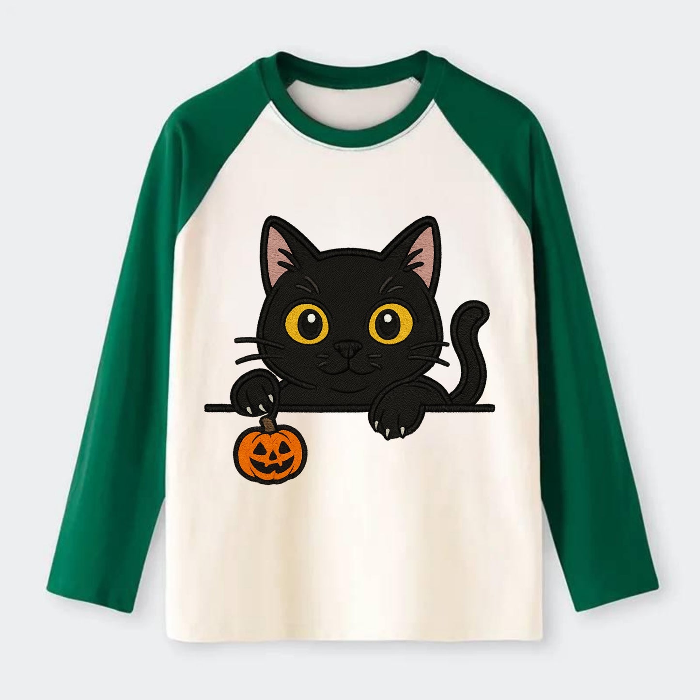 Midnight the black cat poking tongue out playfully while peeking. - Raglan Long Sleeve T-Shirt - Green