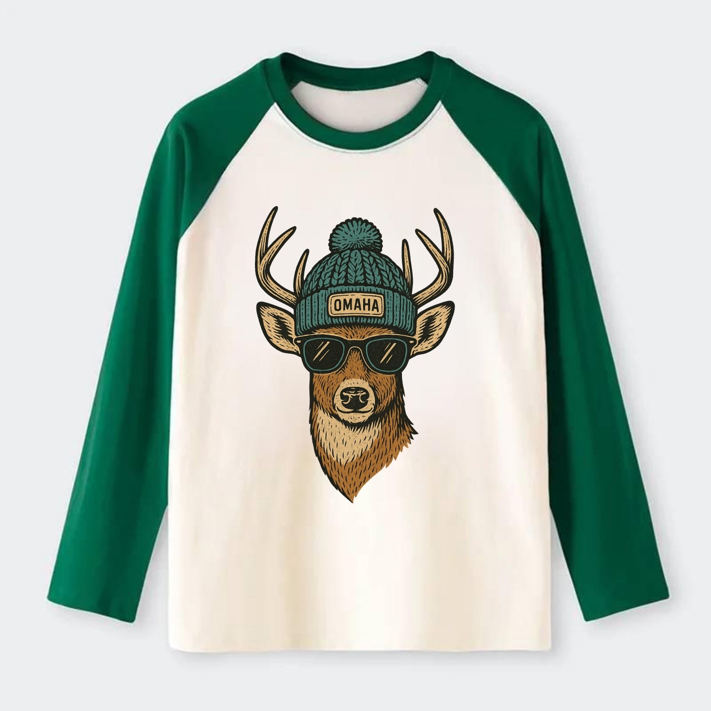 Nebraska White-tailed Deer wearing Omaha beanie with pom pom and - Raglan Long Sleeve T-Shirt - Green