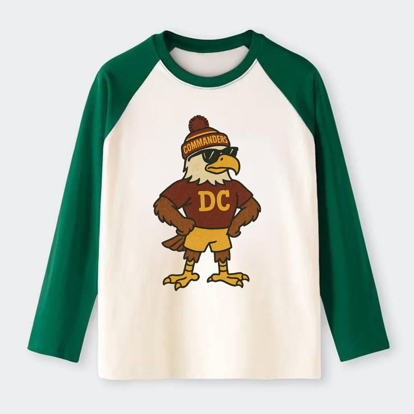 DC Eagle wearing Commanders burgundy and gold beanie with pom pom and - Raglan Long Sleeve T-Shirt - Green