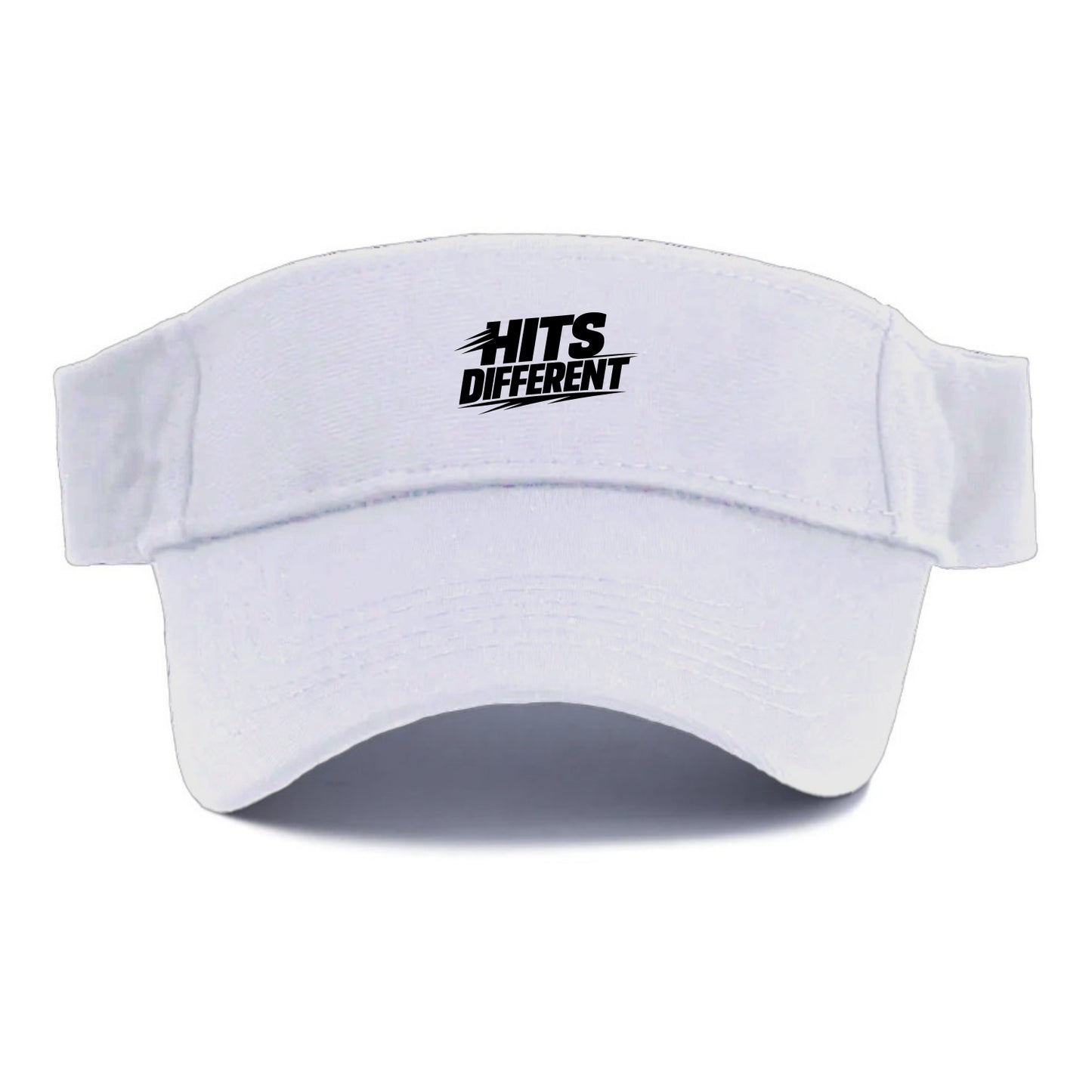 Bold typography design - "HITS DIFFERENT" - uniquely special, stands out - Visor - White