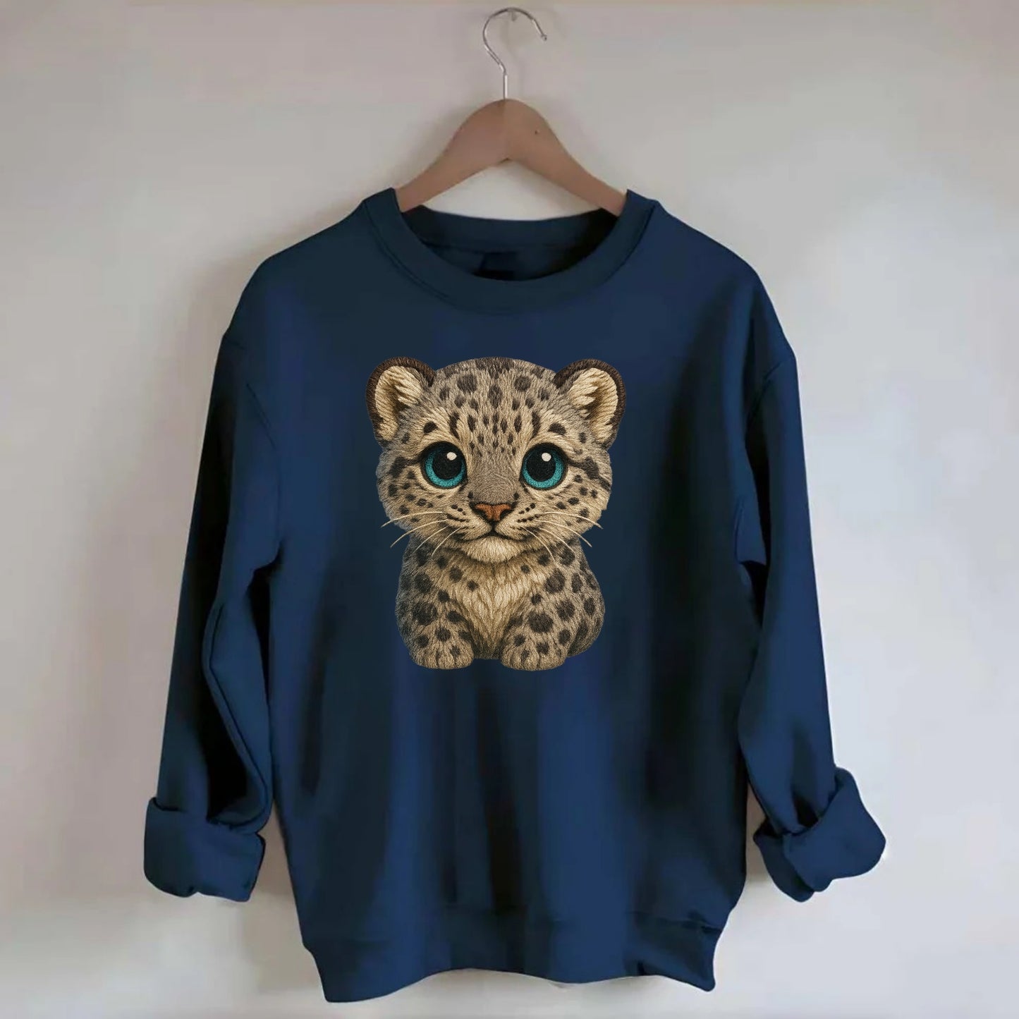 Baby Snow Leopard Cub - gray spotted, thick fur, blue-green eyes, - Crewneck Sweatshirt - navy