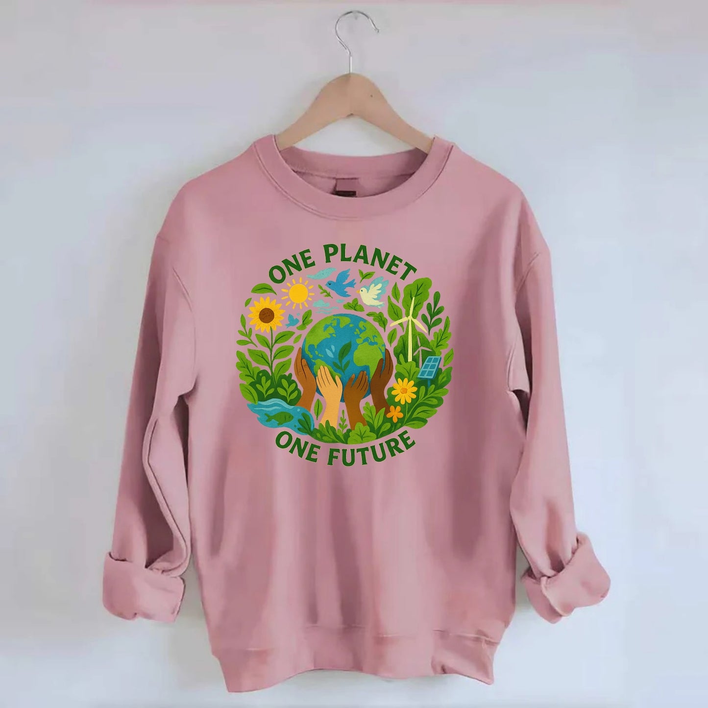 Globe surrounded by hands of all colors working together - "One Planet, One - Crewneck Sweatshirt - pink