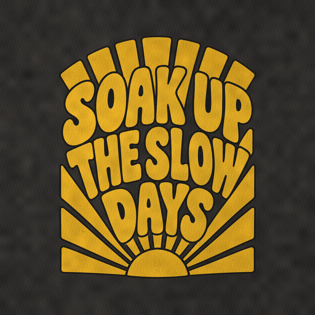 Soak Up The Slow Days Sunburst Sayings Vintage T-shirt – black, print and cotton detail (AI mockup)