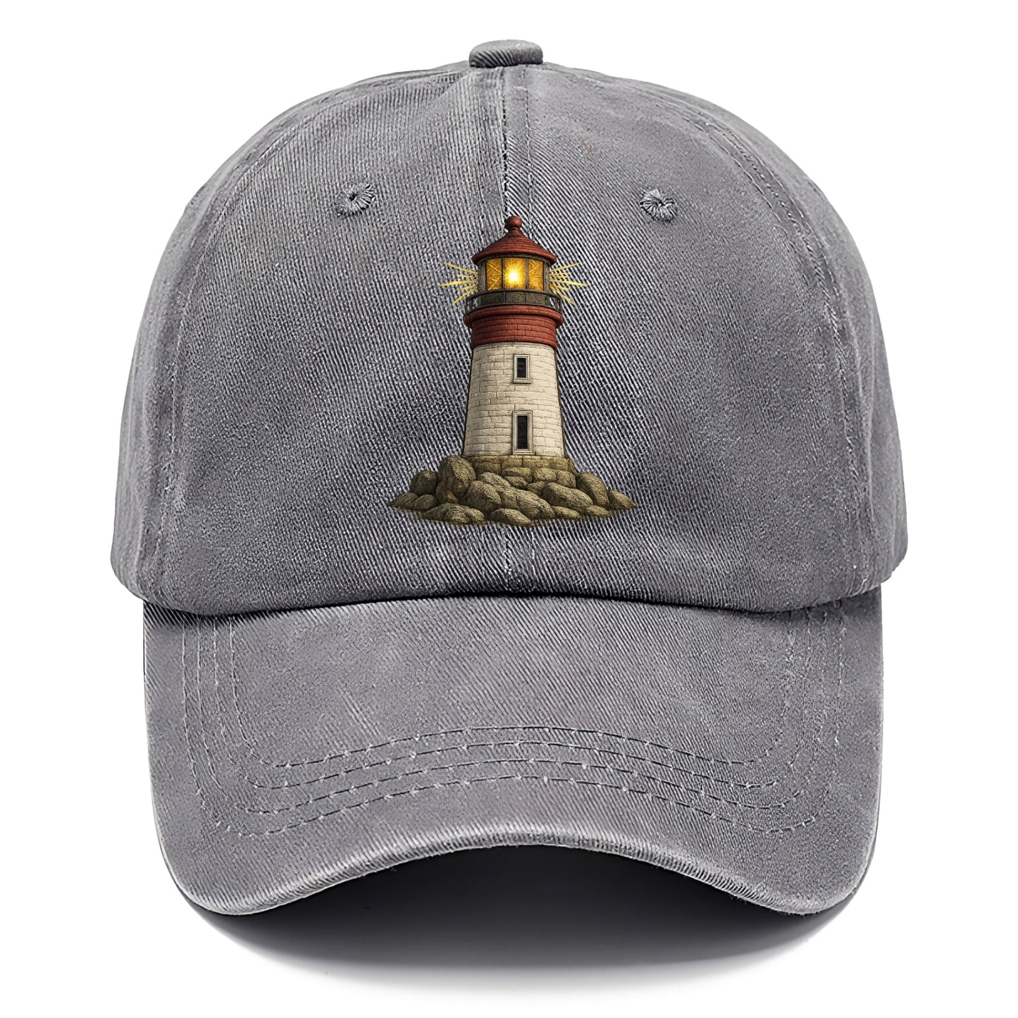 illuminated lighthouse on a rocky shore Hat