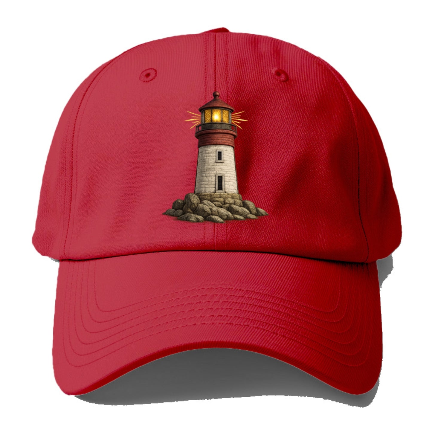 illuminated lighthouse on a rocky shore Hat