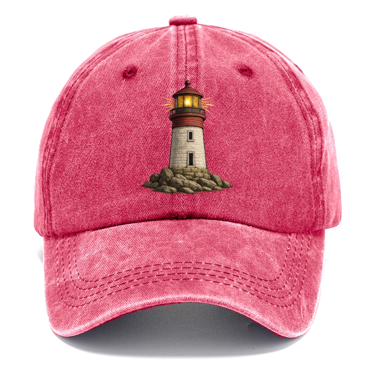 illuminated lighthouse on a rocky shore Hat