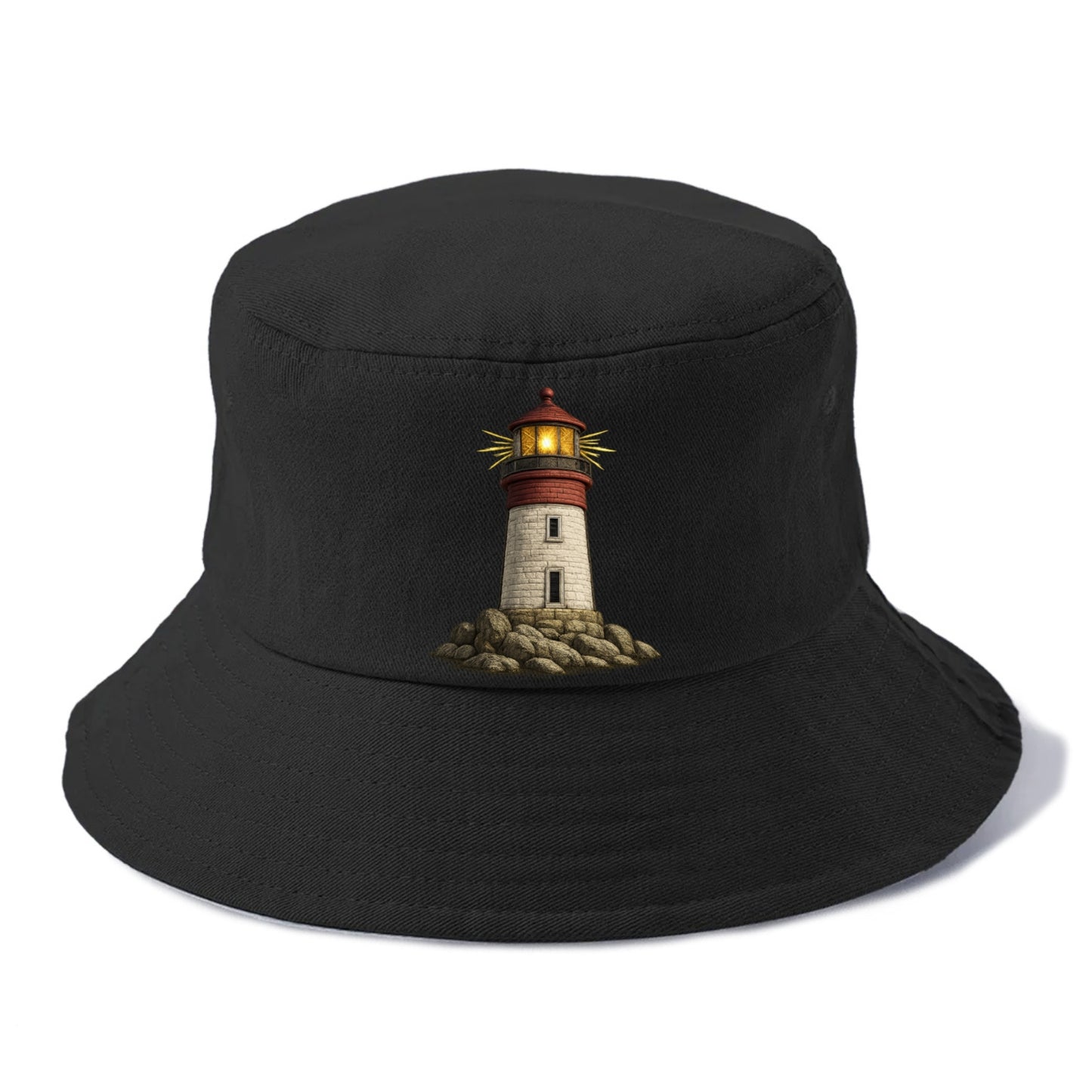 illuminated lighthouse on a rocky shore Hat