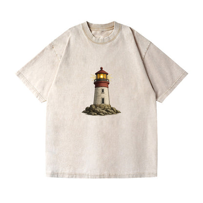 illuminated lighthouse on a rocky shore Hat