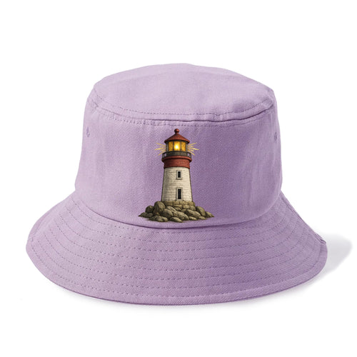 Shining Lighthouse On A Rocky Shore Bucket Hat