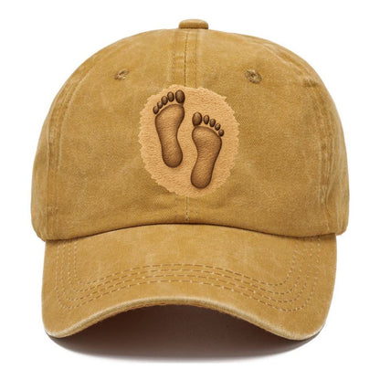 footprints in the sand sepia tone Hat