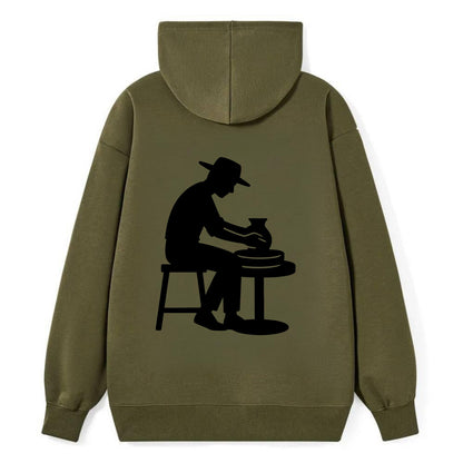 Potter shaping clay on wheel - Classic Pullover Hoodie - ArmyGreen