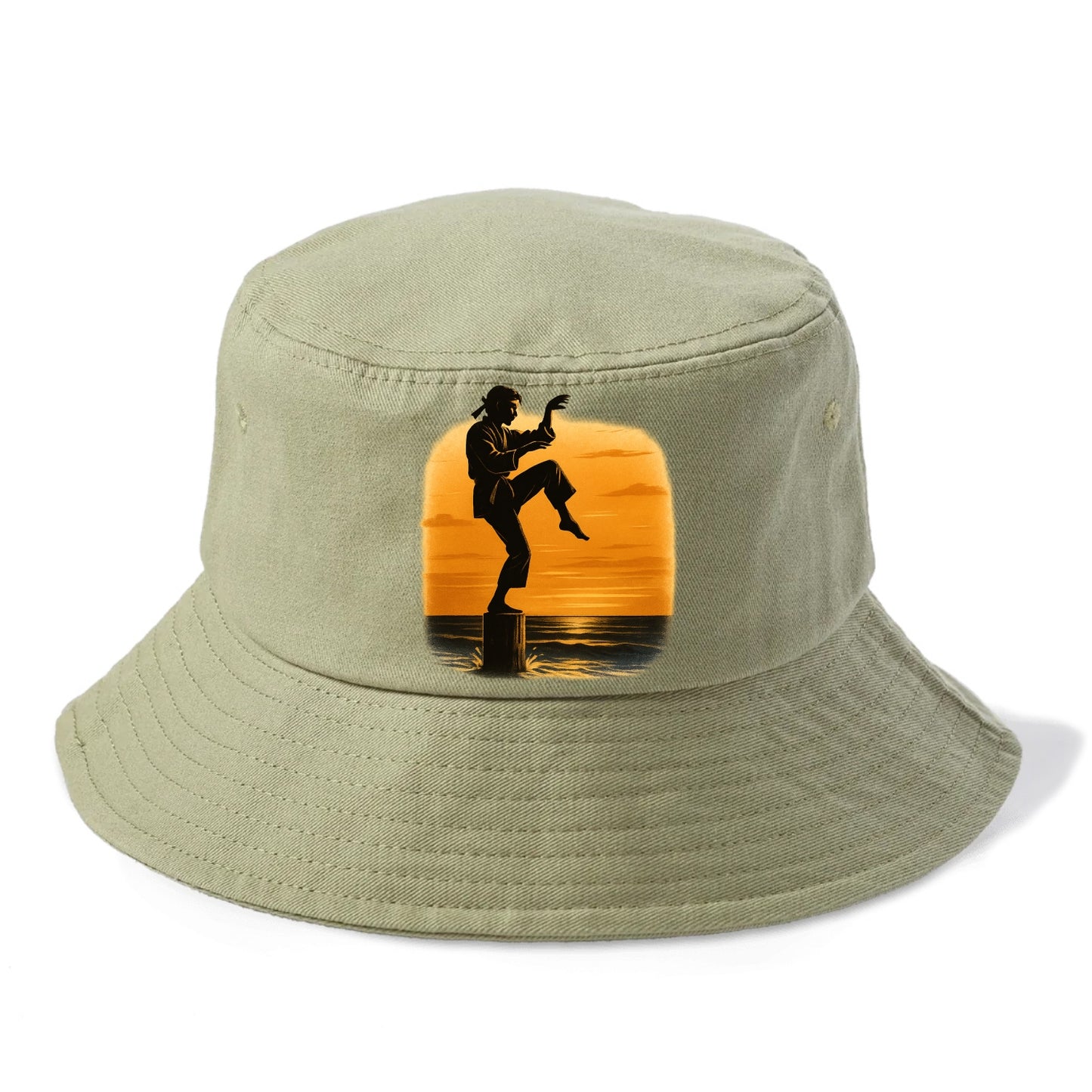 karate crane kick pose on wooden post at beach sunset - Bucket Hat - Army Green