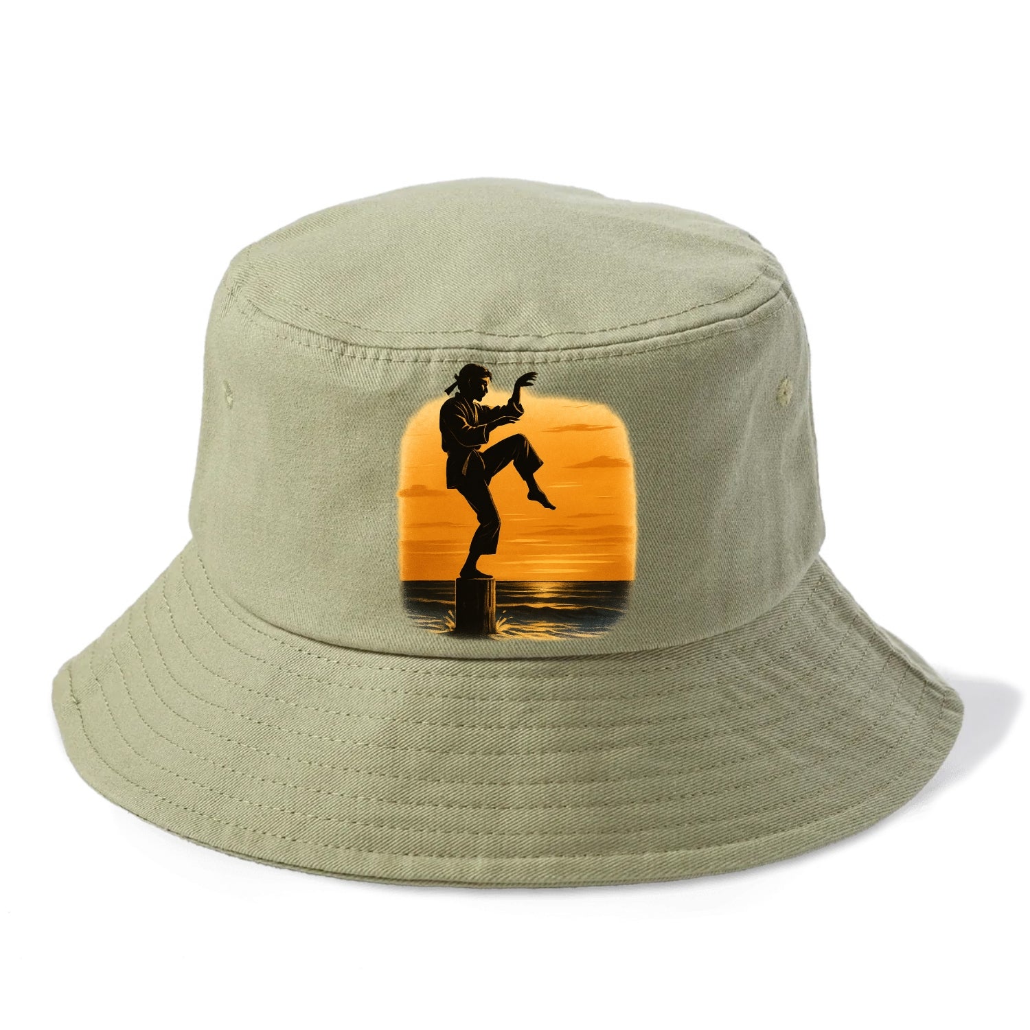 karate crane kick pose on wooden post at beach sunset - Bucket Hat - Army Green