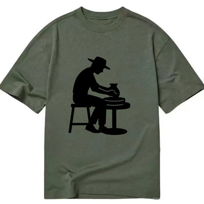 Potter shaping clay on wheel - Classic T-shirt - Army Green