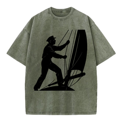 Sailor adjusting the boom on a sailboat - Vintage T-shirt - Army Green