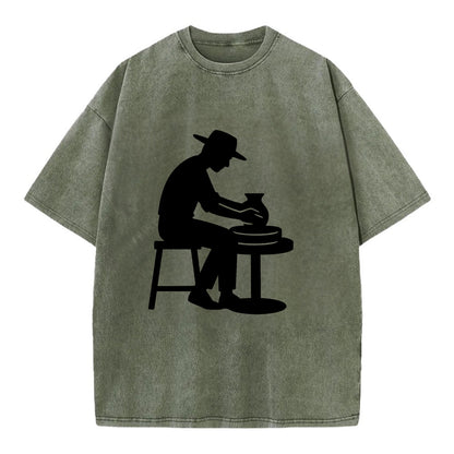 Potter shaping clay on wheel - Vintage T-shirt - Army Green