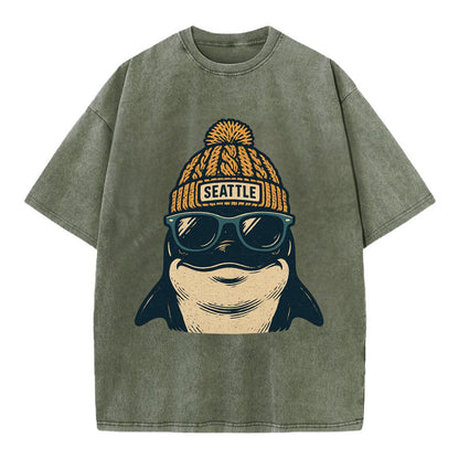 Seattle Orca wearing Seattle beanie with pom pom and wayfarer sunglasses - Vintage T-shirt - Army Green