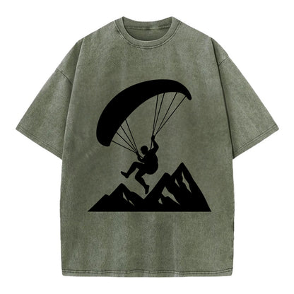 Paraglider soaring over mountain peaks - Vintage T-shirt - Army Green
