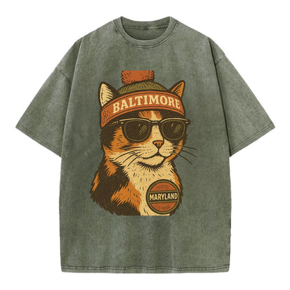 Maryland Calico Cat wearing Baltimore beanie with pom pom and wayfarer sunglasses - Vintage T-shirt - Army Green