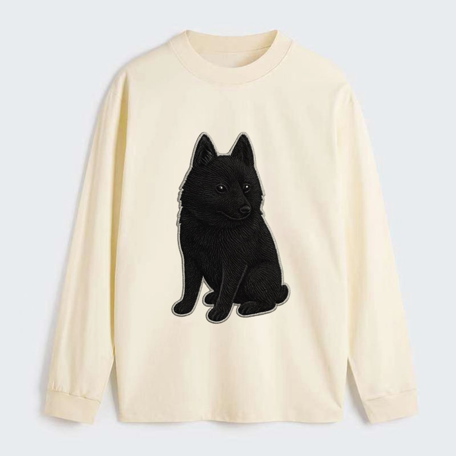 Schipperke - Solid black small embroidered sitting pose - Classic Long Sleeve Shirt - Beige