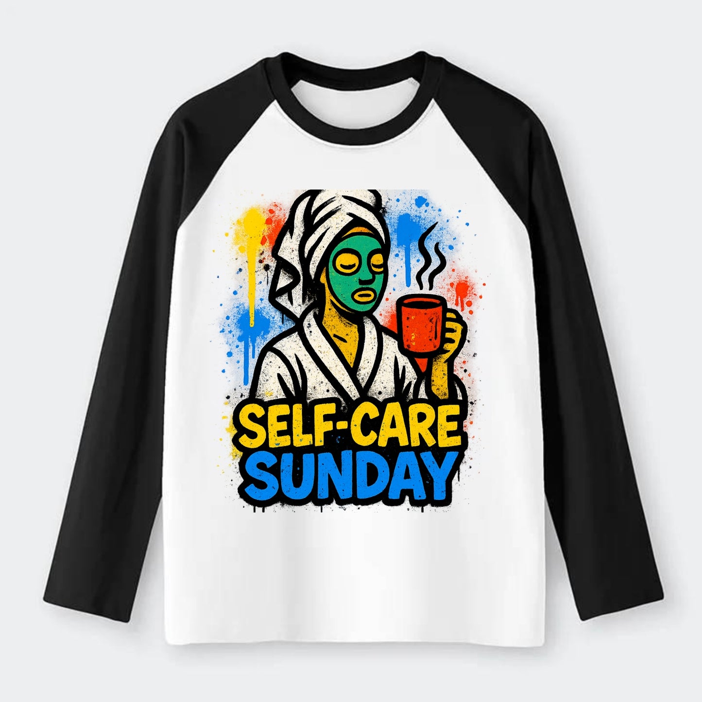 Person in bathrobe with face mask and tea - self-care Sunday ritual, - Raglan Long Sleeve T-Shirt - Black