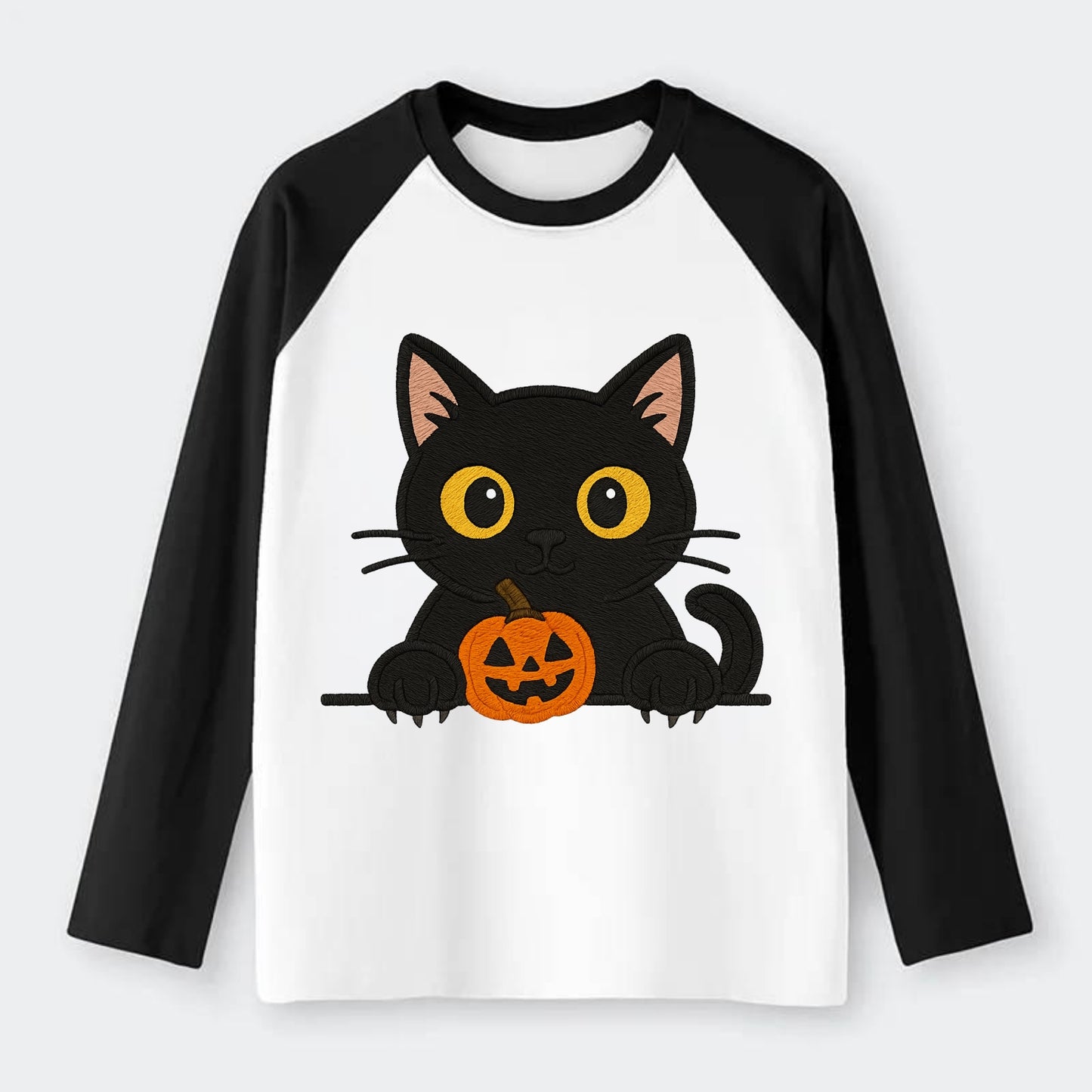 Midnight the black cat wearing round spectacles while studying the - Raglan Long Sleeve T-Shirt - Black
