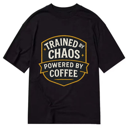 Trained by chaos, powered by coffee - Classic T-shirt - Black