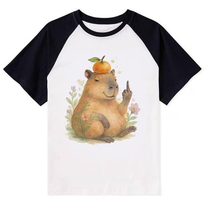 chonky capybara relaxing with orange on head, one webbed middle finger up - Contrast Raglan T-shirt - Black