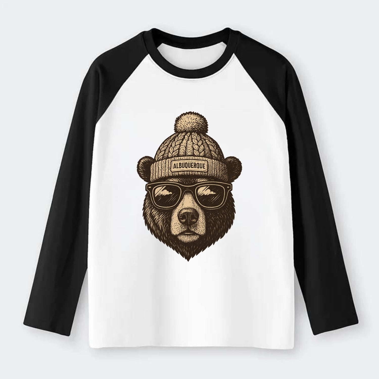 New Mexico Black Bear wearing Albuquerque beanie with pom pom and - Raglan Long Sleeve T-Shirt - Black