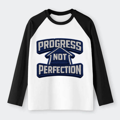 PROGRESS NOT PERFECTION - arrow with text in blue , growth mindset - Raglan Long Sleeve T-Shirt - Black