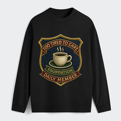 Crest with coffee cup - "Too Tired To Care Foundation - Daily Member" - - Classic Long Sleeve Shirt - Black