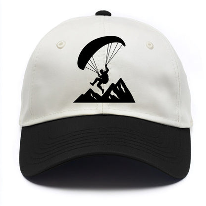 Paraglider soaring over mountain peaks - Two Tone Cap - Black