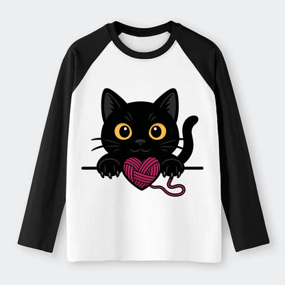 Midnight the black cat stretching tall with claws gently hooked over - Raglan Long Sleeve T-Shirt - Black