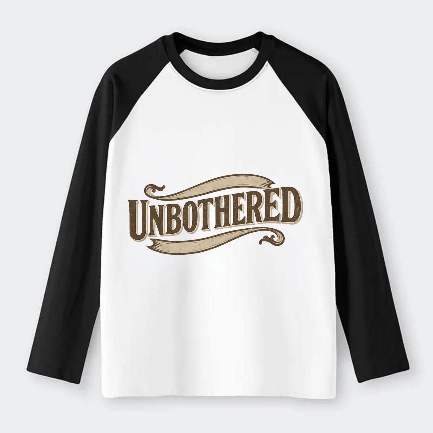 Bold typography design - "UNBOTHERED" - not affected, staying calm - Raglan Long Sleeve T-Shirt - Black