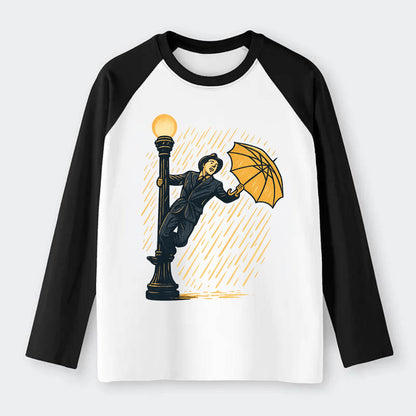 joyful dancing on lamppost in heavy rain with big smile - Raglan Long Sleeve T-Shirt - Black