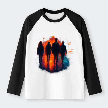 gang of silhouettes walking together at sunset by the beach - Raglan Long Sleeve T-Shirt - Black