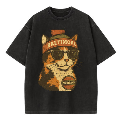 Maryland Calico Cat wearing Baltimore beanie with pom pom and wayfarer sunglasses - Vintage T-shirt - Black