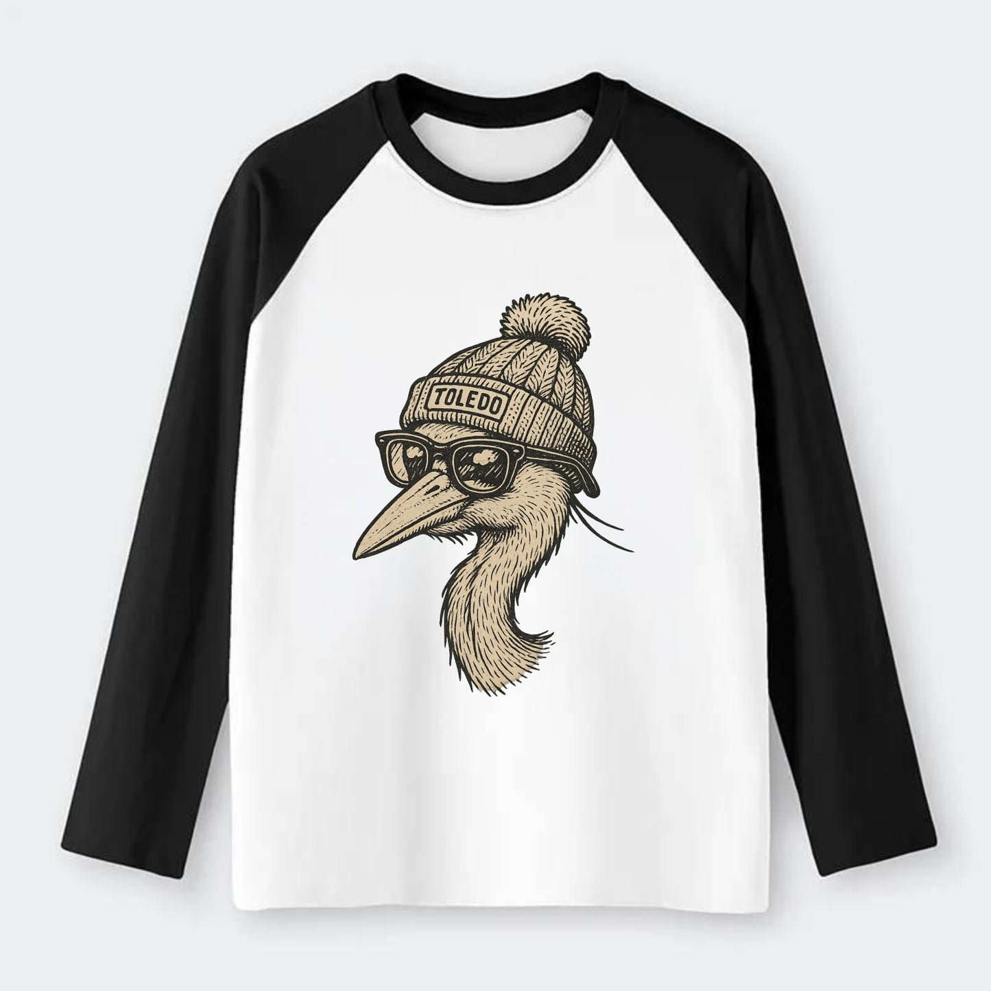 Toledo Great Blue Heron wearing Toledo beanie with pom pom and - Raglan Long Sleeve T-Shirt - Black