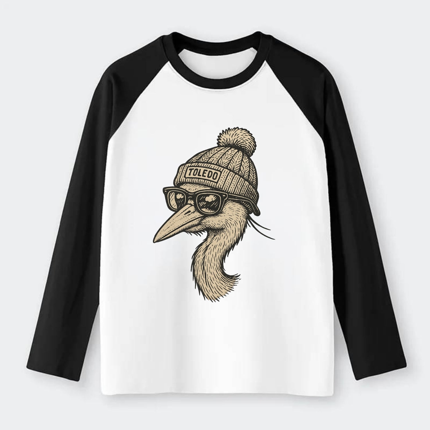 Toledo Great Blue Heron wearing Toledo beanie with pom pom and - Raglan Long Sleeve T-Shirt - Black