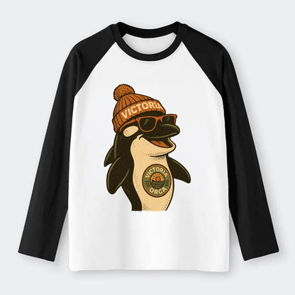 Victoria Orca wearing Victoria beanie wi - Raglan Long Sleeve T-Shirt - Black