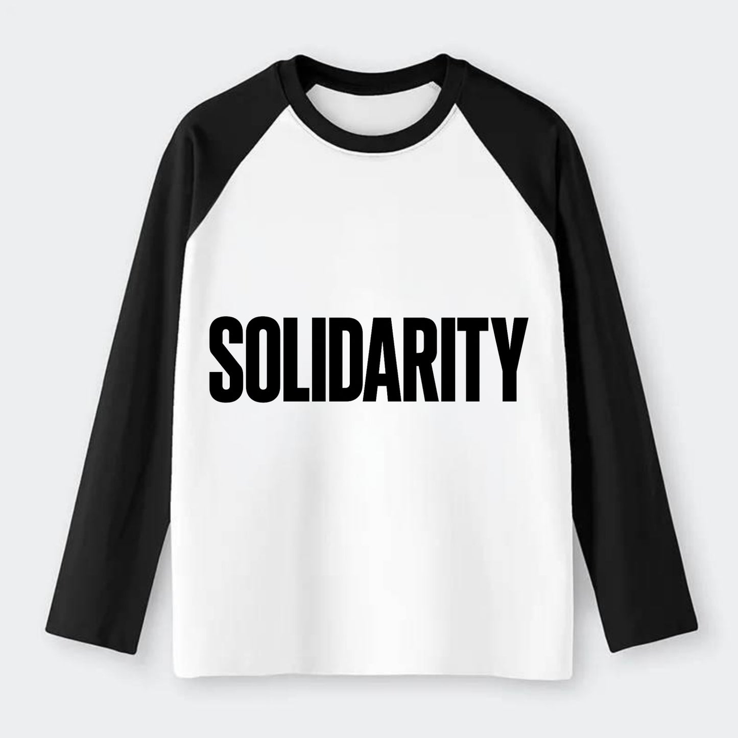 Bold typography design - "SOLIDARITY" - standing together, support - Raglan Long Sleeve T-Shirt - Black