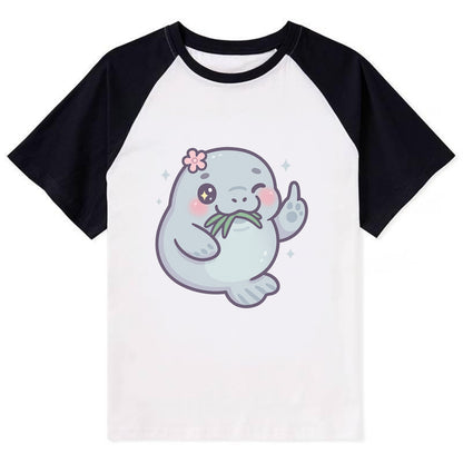 chubby manatee munching on seagrass, one flipper raised with sass - Contrast Raglan T-shirt - Black