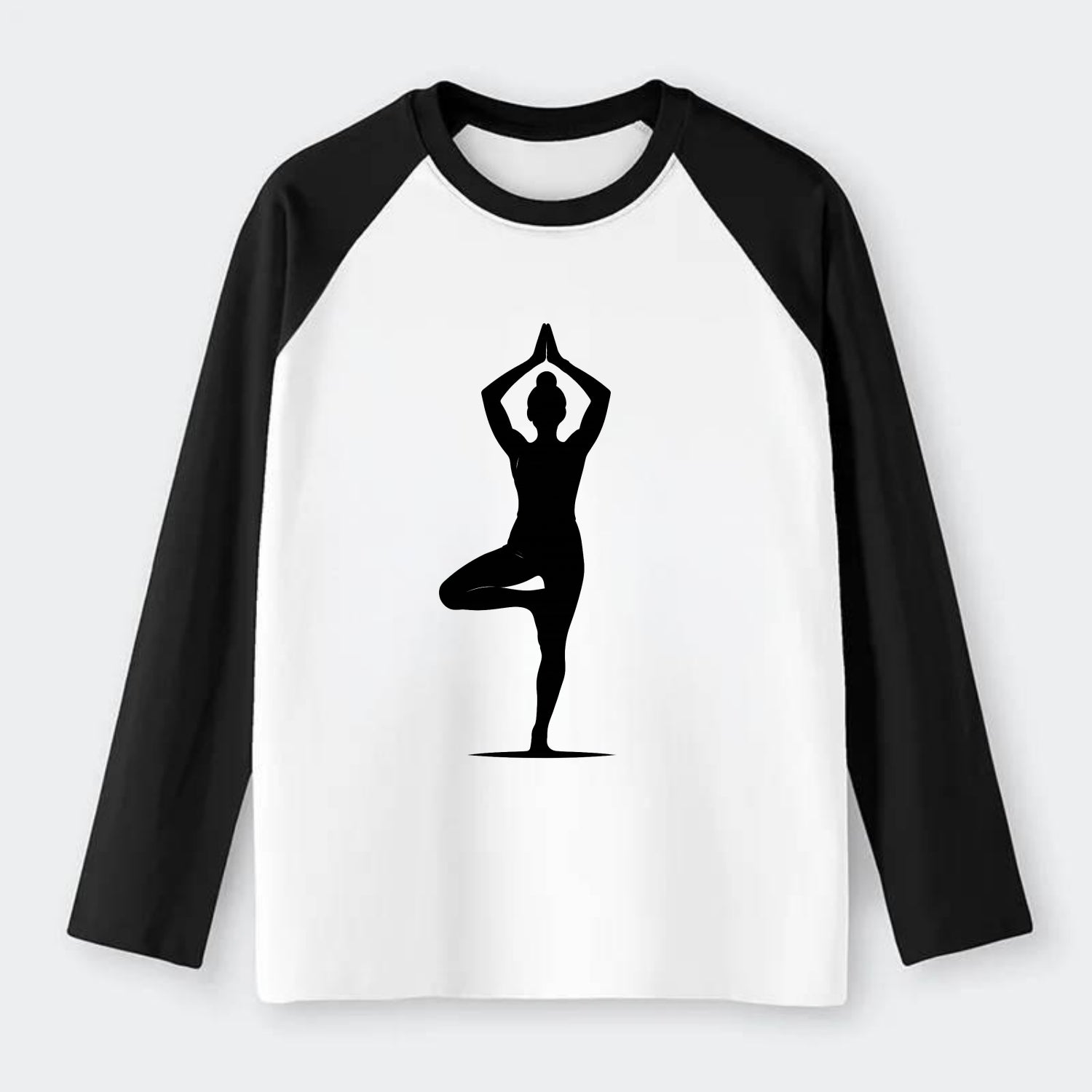 Yoga practitioner in tree pose - Raglan Long Sleeve T-Shirt - Black