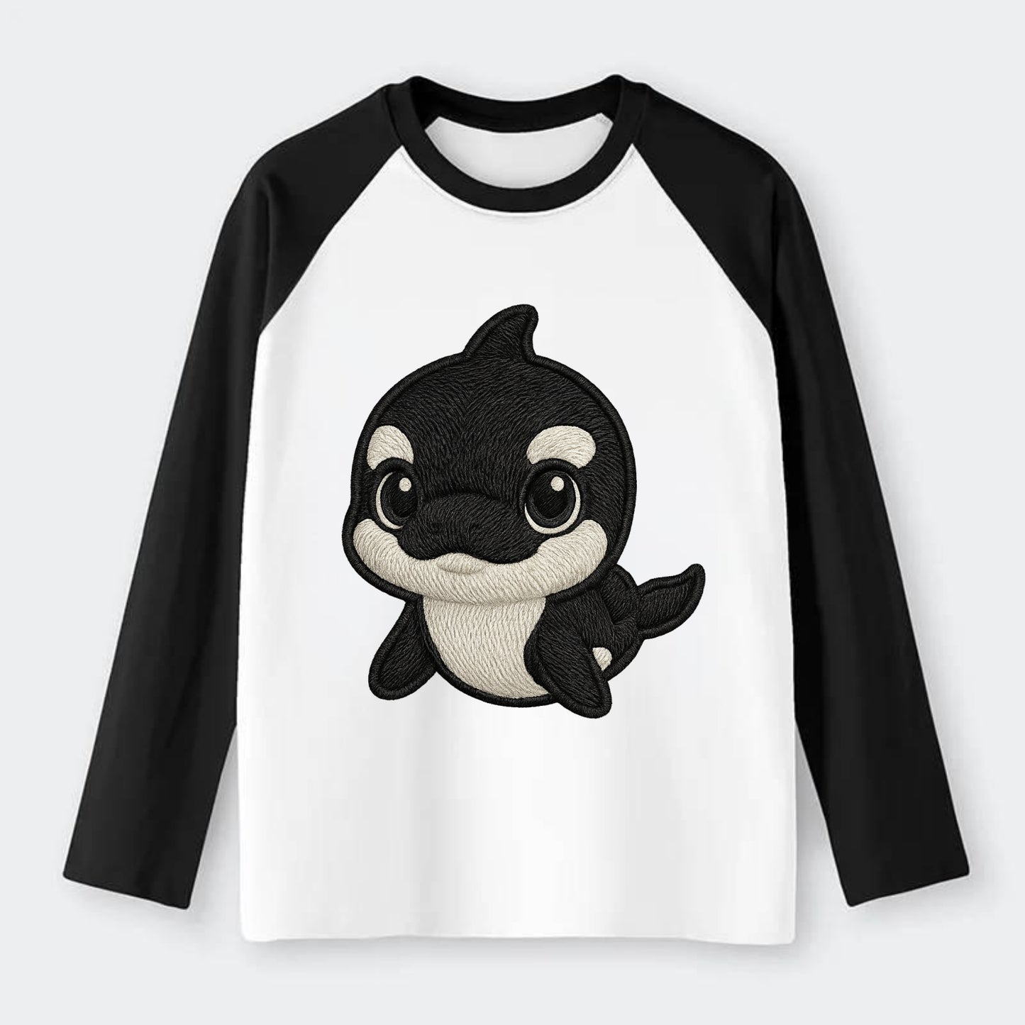 Baby Orca - black and white pattern, white eye patch, front-facing, - Raglan Long Sleeve T-Shirt - Black