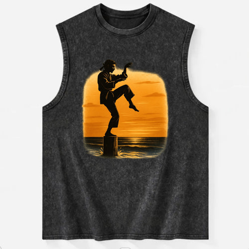 karate crane kick pose on wooden post at beach sunset - Vintage Washed Tank