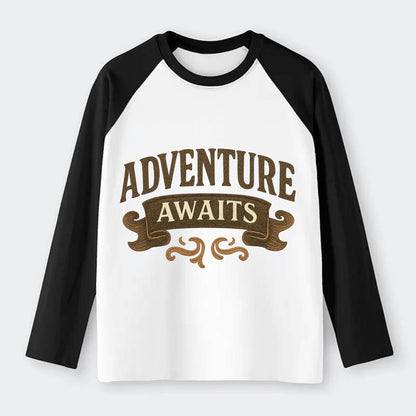 Bold typography design - "ADVENTURE AWAITS" - excitement ahead, ready - Raglan Long Sleeve T-Shirt - Black