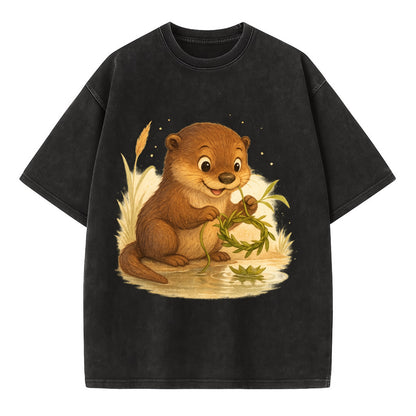 Otter weaving river reeds into a floating crown beside mirror-still water - Vintage T-shirt - Black